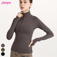 Vestes d'entraînement légères demi-fermeture éclair col montant chemise de sport à manches longues trous pour les pouces Gym Fitness hauts veste de Yoga pour les femmes