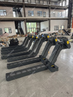 Convoyeur à plaques en acier inoxydable à entraînement motorisé, certifié ISO 9001:2015, d'occasion, à économie d'énergie, type chaîne, réglable