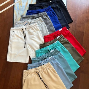 Shorts de sport décontractés pour hommes en molleton technique style drill, 100 % coton, taille élastique avec pression latérale adhésive, motif uni - Product Image 1