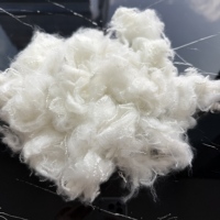 Microfibre de polyester vierge super fine 0,9D, 64 mm, siliconée, pour doudoune et couette d'hiver, offrant une grande solidité