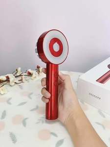 Dispositivo de Masaje Capilar Portátil Multifuncional 3 en 1 con Luz Roja, EMS, Vibración, TMS, Aplicador de Aceite de Silicona y ABS para el Crecimiento del Cabello - Product Image 2