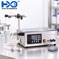 Machine de remplissage semi-automatique à double tête pour liquides, eau, boissons, jus, emballage de bouteilles en plastique et petite ligne de production