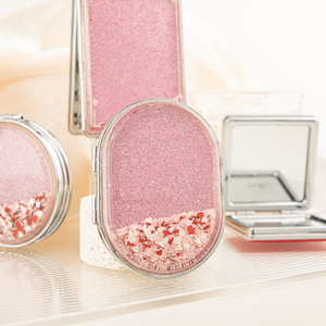 Espejo de Maquillaje Ovalado Estético con Arena Líquida Flotante, Espejo Cosmético de Bolsillo Plegable de Doble Cara con Cristal HD para Viaje, Logotipo Personalizado - Product Image 1