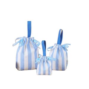 Custom <b>Blue</b> Striped Drawstring Gift Bag Reusable <b>Canvas</b> Christmas Candy Present Bag with Handle for Holiday Parties - Product Image 1