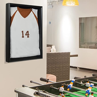 Cadre photo artisanal en MDF et métal avec boîte à ombre en verre pour maillot de sport
