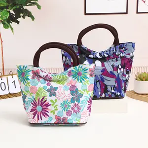 Fábrica al por mayor nueva venta caliente de alta calidad portátil colorido moda Picnic bolsa flores impresión señoras bolsos