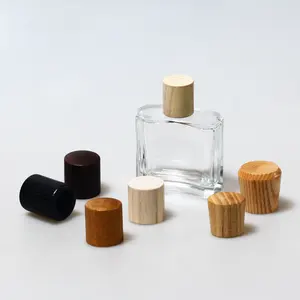 غطاء زجاجة عطر زجاجي مع خشب لمكونات السوائل والعطور 2024 تصميم جديد من المصنع في الصين غطاء خشبي لمكونات السوائل والعطور