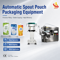 Machine automatique de remplissage et de bouchage de sachets à bec verseur Doypack pour liquides, sauces et détergents