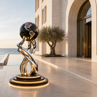 Sculpture de globe terrestre en acier inoxydable sur mesure, grande statue d'art métallique torsadée polie miroir pour aménagement paysager de cour de luxe