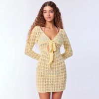 2026 Robe de plage cache-maillot en tricot ajouré sexy pour femme, nouveau style d'été, tendance internationale, tenue de protection solaire