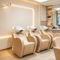Fauteuil de lavage électrique moderne de luxe à hauteur réglable avec bac en céramique durable, structure en bois et revêtement en cuir PU écologique pour salle de bain