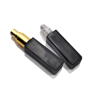 Guangzhou factory wholesale 10ml mini size multi color glass essential oil perfume roll on ball bottle with screw neck spray cap