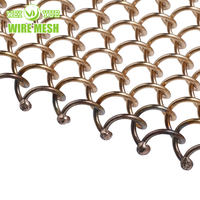 Rideau en maille spirale de draperie de bobine en métal résistant à la corrosion pour entrepôt/cloison de studio/revêtement mural décoratif/ombre de fenêtre