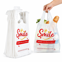 Présentoir suspendu pour t-shirts et gilets imprimés White Smile, emballage empilable, en PEHD recyclable et imperméable, pour supermarché et courses