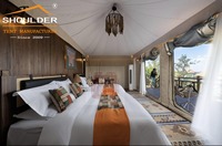 Tente d'hôtel de luxe imperméable de style hôtelier de plein air tente de glamping lodge en toile pour hôtel tente de villégiature