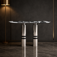 Console moderne minimaliste avec plateau en marbre noir, table d'entrée de luxe avec miroir et pieds en acier inoxydable