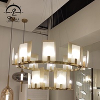 Lustre moderne rond en albâtre naturel doré de luxe avec éclairage LED pour salon et salle à manger
