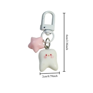 سلاسل مفاتيح مضحكة على شكل أسنان وردية وقلادات نجمة وردية، حلقات مفاتيح من الراتنج على شكل أسنان بيضاء، هدايا لعيادات الأسنان وأطباء الأسنان - Product Image 5