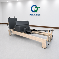 Reformer Pilates Kayu Maple Abu-abu Tua dengan Rel Tetap untuk Latihan Intensitas Tinggi dan Fasilitas Gym Hotel Mewah