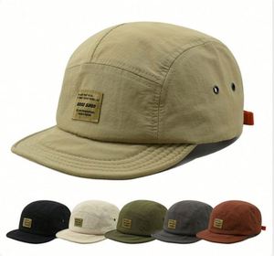 Casquettes de baseball à visière courte en tissu Oxford Dobby à pois avec logo personnalisé, séchage rapide, protection solaire, bord souple, lot de cinq pièces - Product Image 1