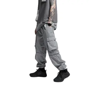 Pantalones venta al por mayor del fabricante de los hombres al aire libre hip-hop últimos 3M reflejan Logotipo de lujo jogger de nylon Pantalones