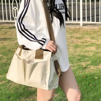 Sac fourre-tout en toile personnalisé, multi-poches, bandoulière amovible et réglable, sac bandoulière en coton pour le travail, l'école, les cadeaux, vente en gros