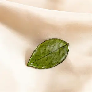 Nouvelle broche de feuille de Rose broche de goutte de feuille verte broche exquise haut de gamme pour femmes épingle de revers