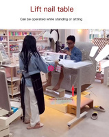 Vente en gros de Yicheng Beauty nouvelle table et chaise d'art d'ongle modernes et simples, table populaire de façonnage de pied à vendre