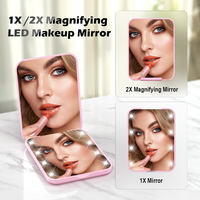 Miroir de poche portable pour femmes 8 lumières LED Lampes de maquillage pliables Mini double grossissement Miroirs à main cosmétiques personnalisés