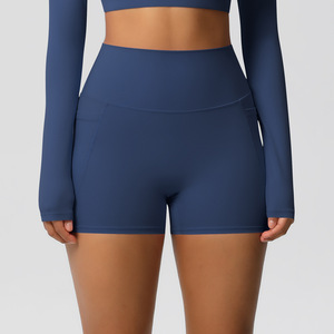 Shorts de ciclista de cintura alta para mujer al por mayor con bolsillo para teléfono, efecto melocotón, control de abdomen, transpirables, elásticos, para yoga y fitness OEM ODM - Product Image 2