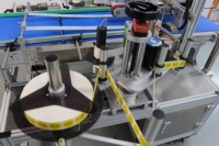 Machine d'étiquetage d'autocollants adhésifs inviolables double face pour scellage de boîtes