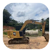 Excavatrice compacte sur chenilles d'occasion CAT 310 avec moteur puissant et performances hydrauliques fluides