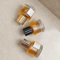 Botol parfum kaca silinder pendek 40ml dapat didaur ulang dengan pita emas/perak/hitam tutup kosong dan disegel dengan semprotan pompa