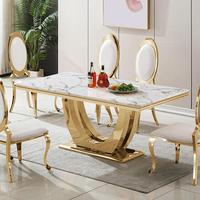 Table de salle à manger rectangulaire en marbre haut de gamme en acier inoxydable, table et chaises de luxe pour la maison