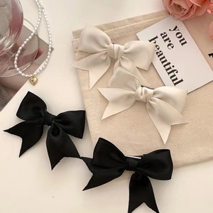 Super sweet and adorable new trendy braided <b>bow</b> hair <b>clip</b> for wispy bangs, perfect for adding a cute side-swept look. - Product Image 1