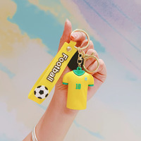 Ventes en gros de maillots de football, porte-clés cadeaux, jouets de football, acceptation de logo personnalisé, cadeau de fête, jouet capsule pour enfants et adultes