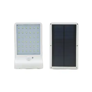 โคมไฟติดผนังพลังงานแสงอาทิตย์ ราคาโรงงาน ip65 กันน้ํา 2-in-1 ไฟรักษาความปลอดภัยกลางแจ้ง ไฟพลังงานแสงอาทิตย์บนผนัง