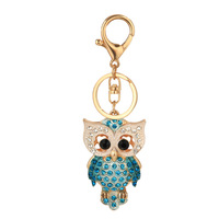 Porte-clés hibou entièrement orné de strass, breloque de sac en alliage doré avec oiseau en cristal pour femme, idéal pour les fêtes et anniversaires, vente en gros