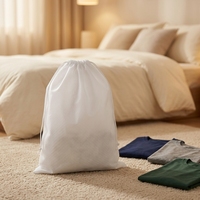 Sac à linge en non-tissé recyclable blanc bon marché avec cordon de serrage pour hôtel de luxe