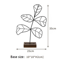 Maroquinerie en fil de fleurs en métal directement à l'usine, décoration artistique moderne, motif feuille montres, esthétique minimaliste avec support