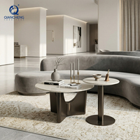 Table basse moderne en marbre avec base en acier inoxydable, vente en gros directe d'usine, table ronde pour hall d'hôtel, mobilier de salon