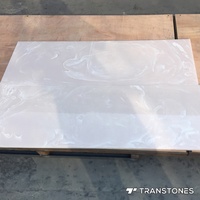 Panneau mural TV en onyx artificiel rose translucide poli en pierre de grande dalle en gros