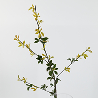 Branches de thé Pu'er artificielles ultra-réalistes, plantes vertes hautement simulées pour la décoration intérieure, les hôtels, les salons et les arrangements floraux.