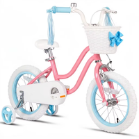 Vélo pour filles de 16 pouces, cadre en acier au carbone, édition rose rêveuse et blanc, accents bleu clair, panier orné d'un nœud, poignée à pompons, stable