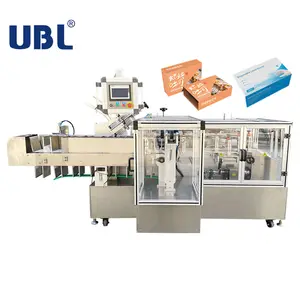 Mesin pengemasan susu otomatis UBL mesin kemasan masker mesin cartoning permen