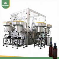 Machine de remplissage et de bouchage automatique haute précision à 4 têtes pour flacons pulvérisateurs sans goutte