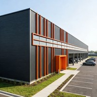 Edificio de Estructura de Acero con Paneles de Acero Recubiertos de Color Negro y Naranja Modernos, Lámina de Acero de Color Personalizado para Almacenes y Talleres