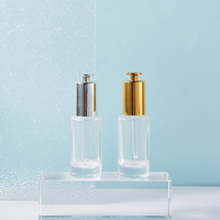 Nouveauté : Emballage en verre haut de gamme pour soins de la peau : flacons compte-gouttes pour huiles essentielles de 30 ml et flacons à pompe dorée pour sérum de 40 ml