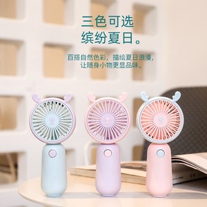 Mini ventilateur portable rechargeable par USB Dispositif de refroidissement par air de conception simple de dessin animé pour la maison, l'extérieur et la voiture. - Product Image 3