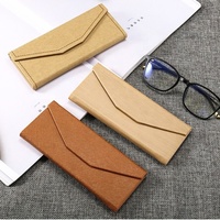 Étui à lunettes pliable triangulaire en cuir PU, vente en gros d'usine, logo personnalisé, boîte de rangement pour lunettes de soleil faite à la main pour hommes et femmes